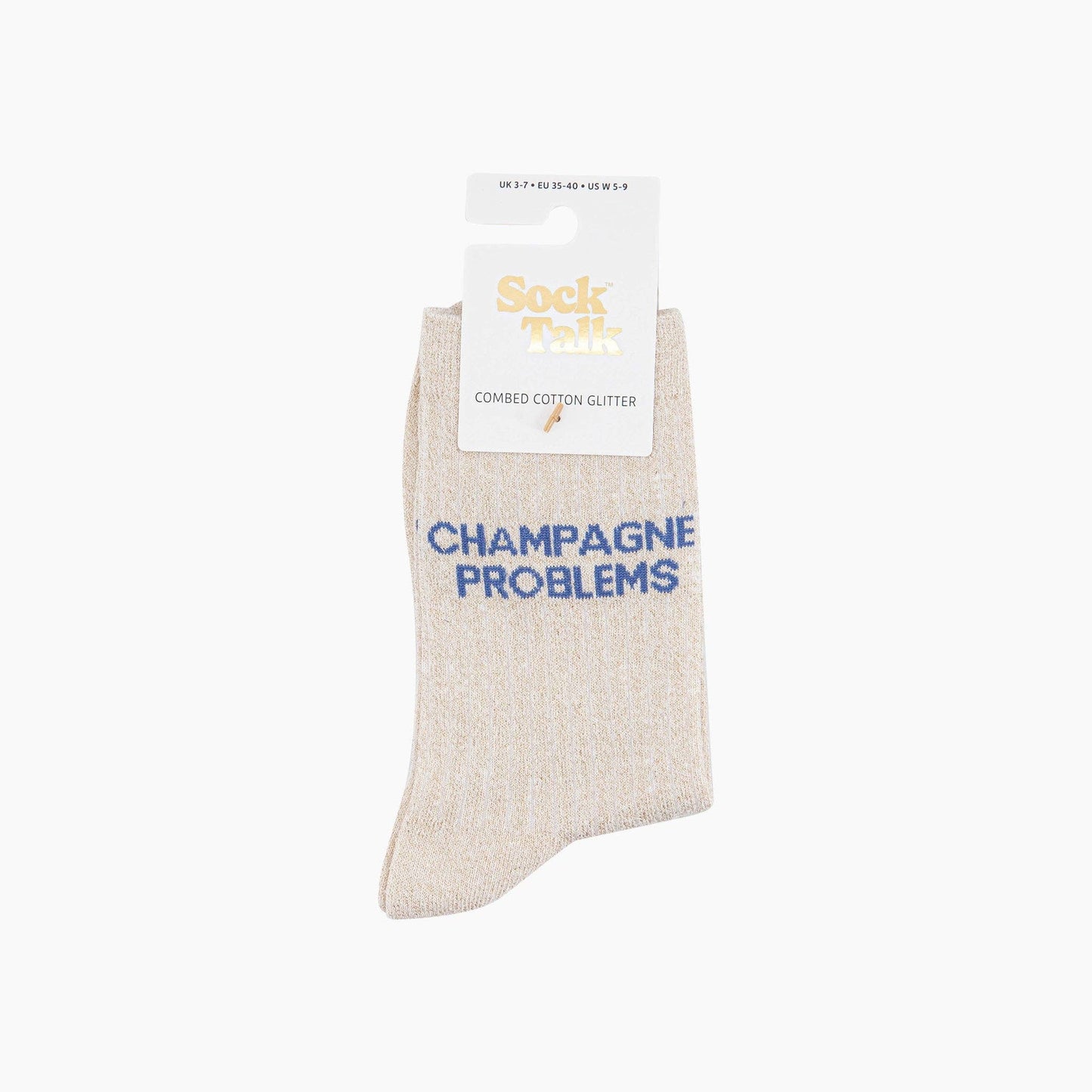 Beige sock with 'Champagne Problems' text on a white background