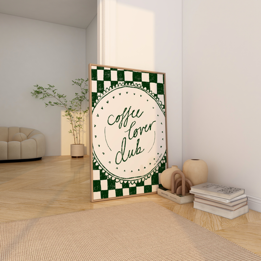 Coffee lover club print typography on a round scalloped plate with a green checkerboard background.