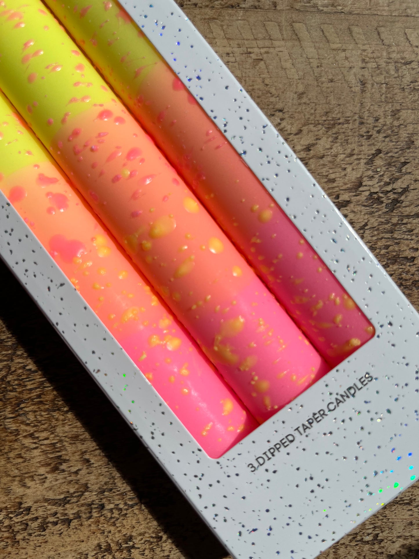 Neon splatter taper dinner candles