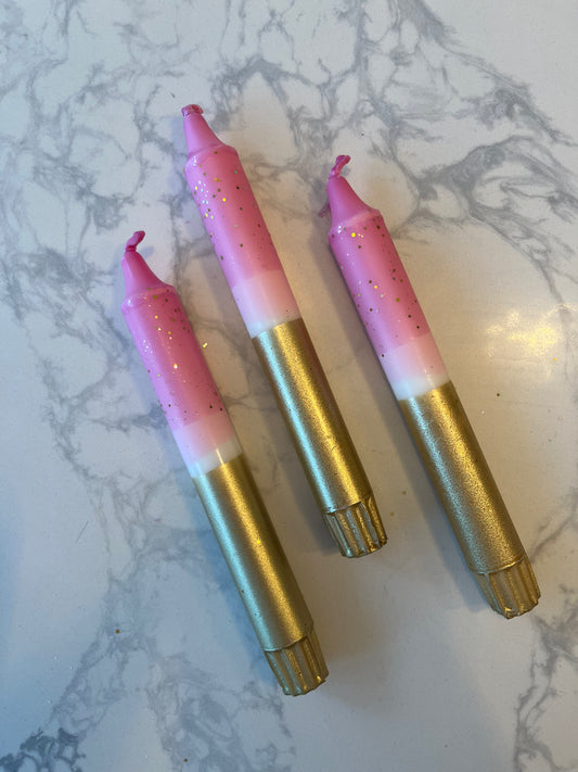 Pink and gold dipped glitter candles
