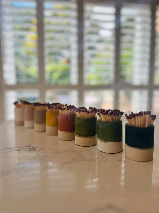 Two tone match pot with striker