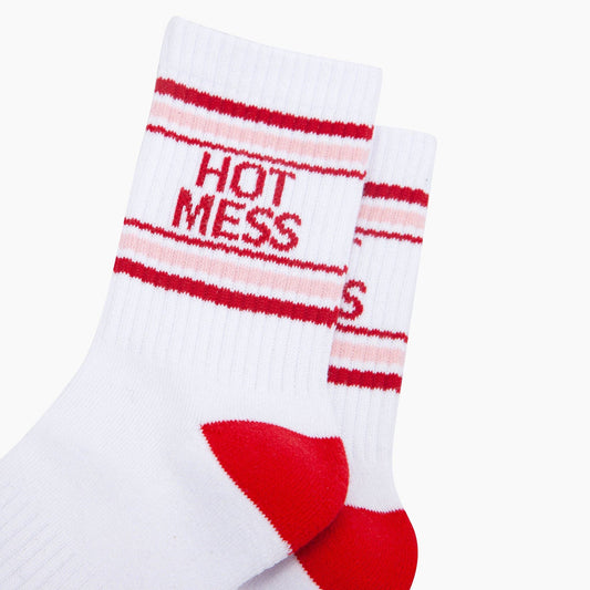 White sock with red and pink stripes and 'Hot Mess' text on a white background
