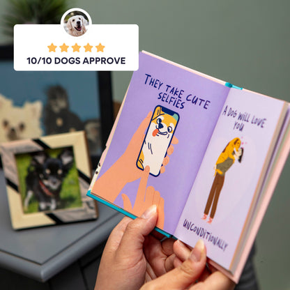 person holding an open book next to a photo of a dog