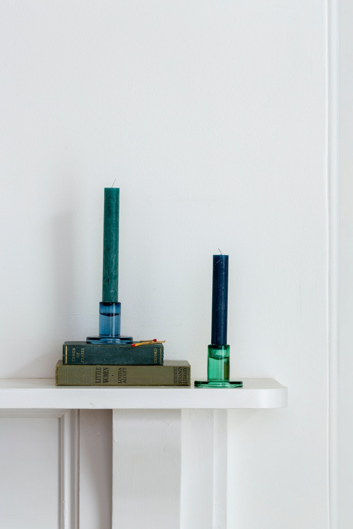 Mini glass candleholders, blue and green styled together