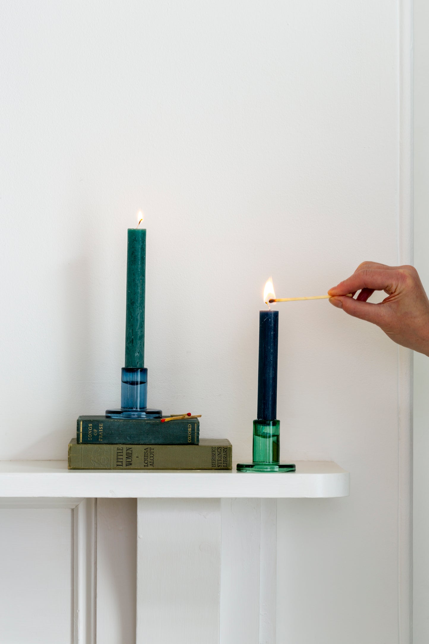 Mini glass candleholders, blue and green styled together