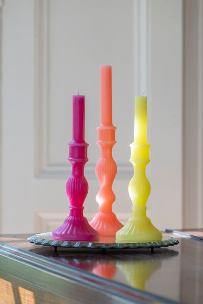 Candlestick shaped candles, styled group including fuchsia
