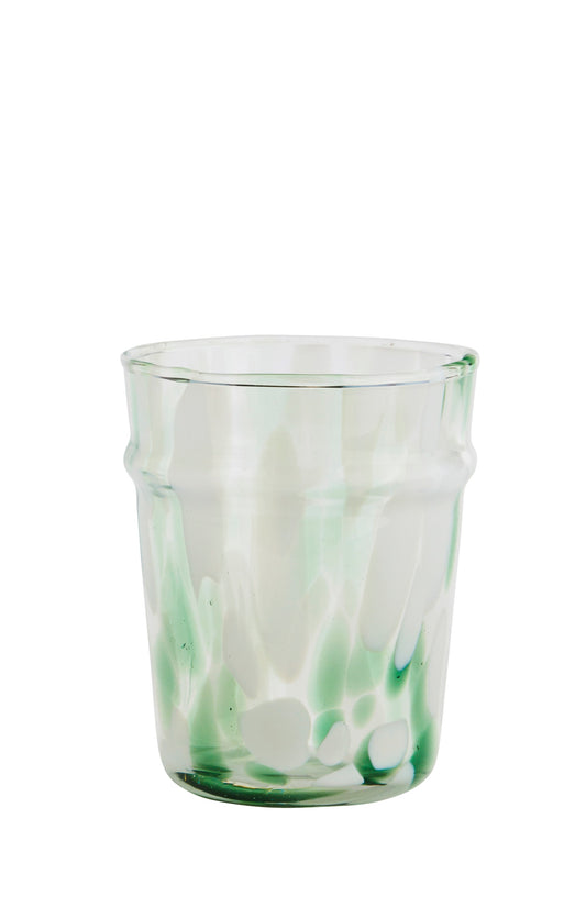 White and green coloured drinking glass