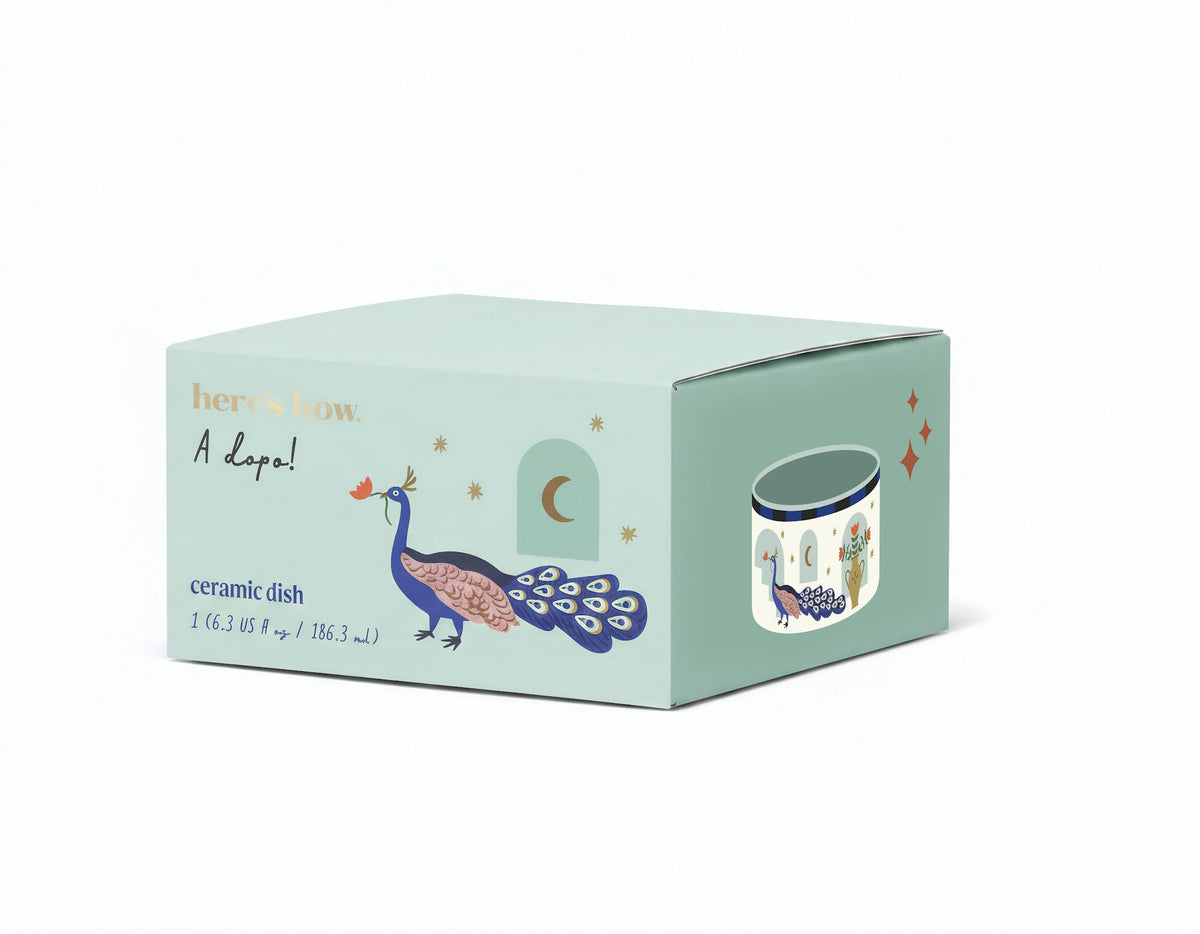 A Dopo ceramic dish, peacock
