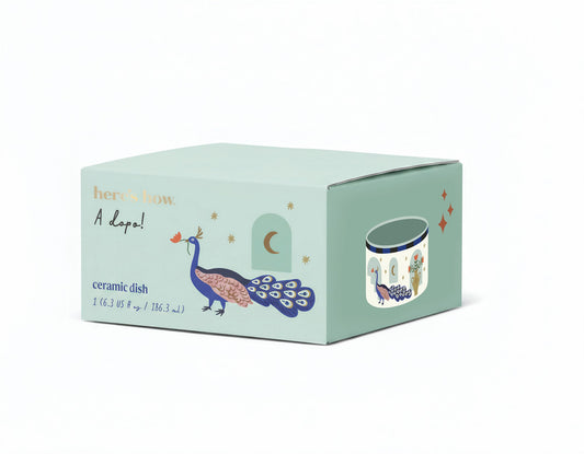 A Dopo ceramic dish, peacock