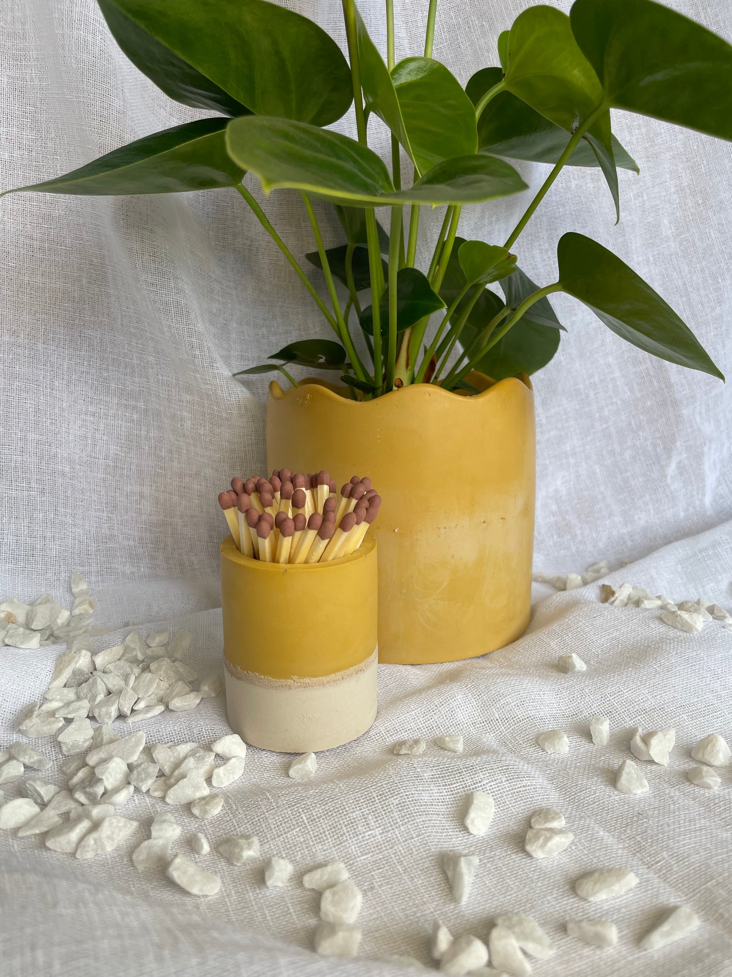 Two tone match pot with striker