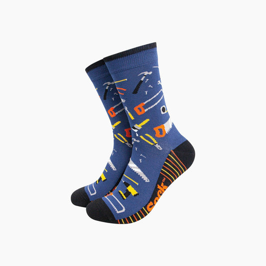Blue socks with DIY tool patterns on a white background