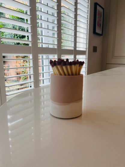 Two tone match pot with striker