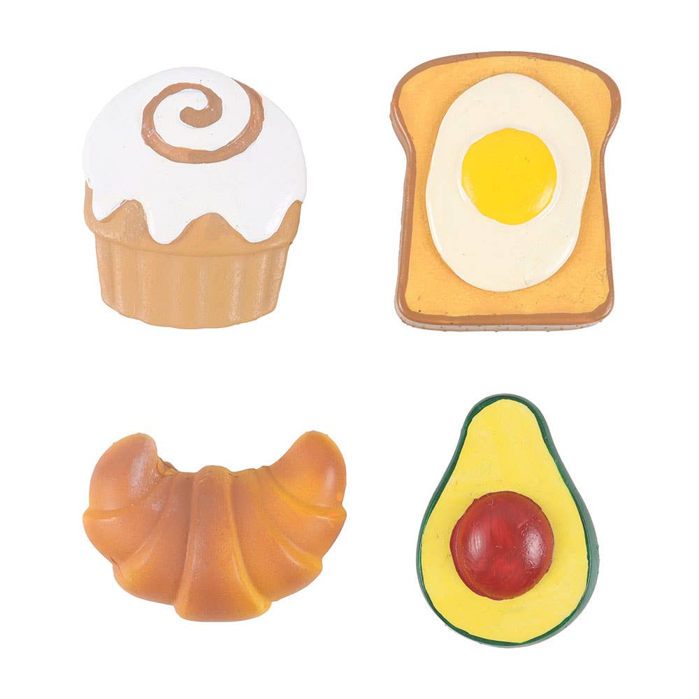 Set of four food-shaped magnets on a white background