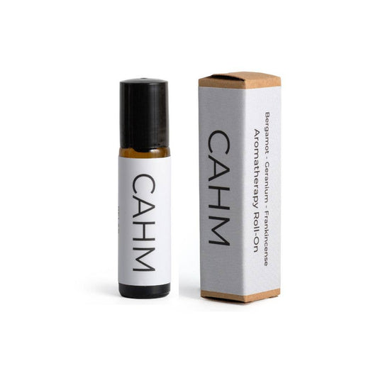 CAHM aromatherapy roll-on bottle and packaging on a white background