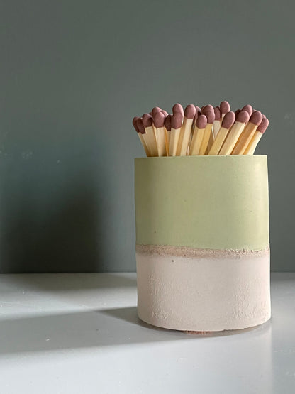 Two tone match pot with striker