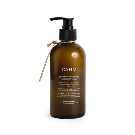 Brown bottle with black pump labeled 'CAHM' on a white background