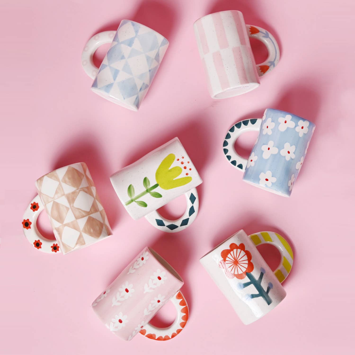 Colourful handpainted mugs