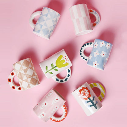 Colourful handpainted mugs