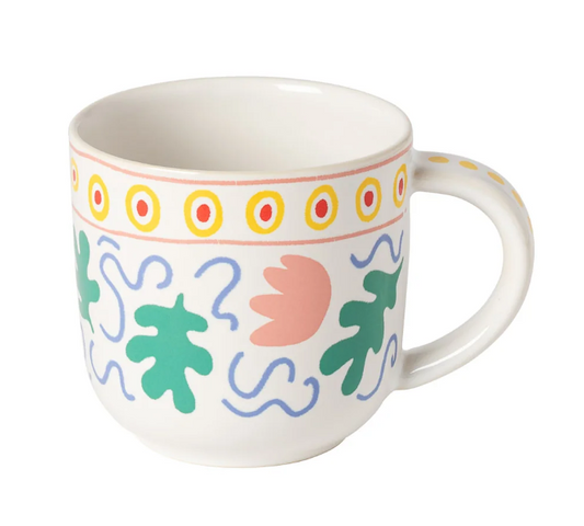 White mug with colorful abstract patterns on a white background