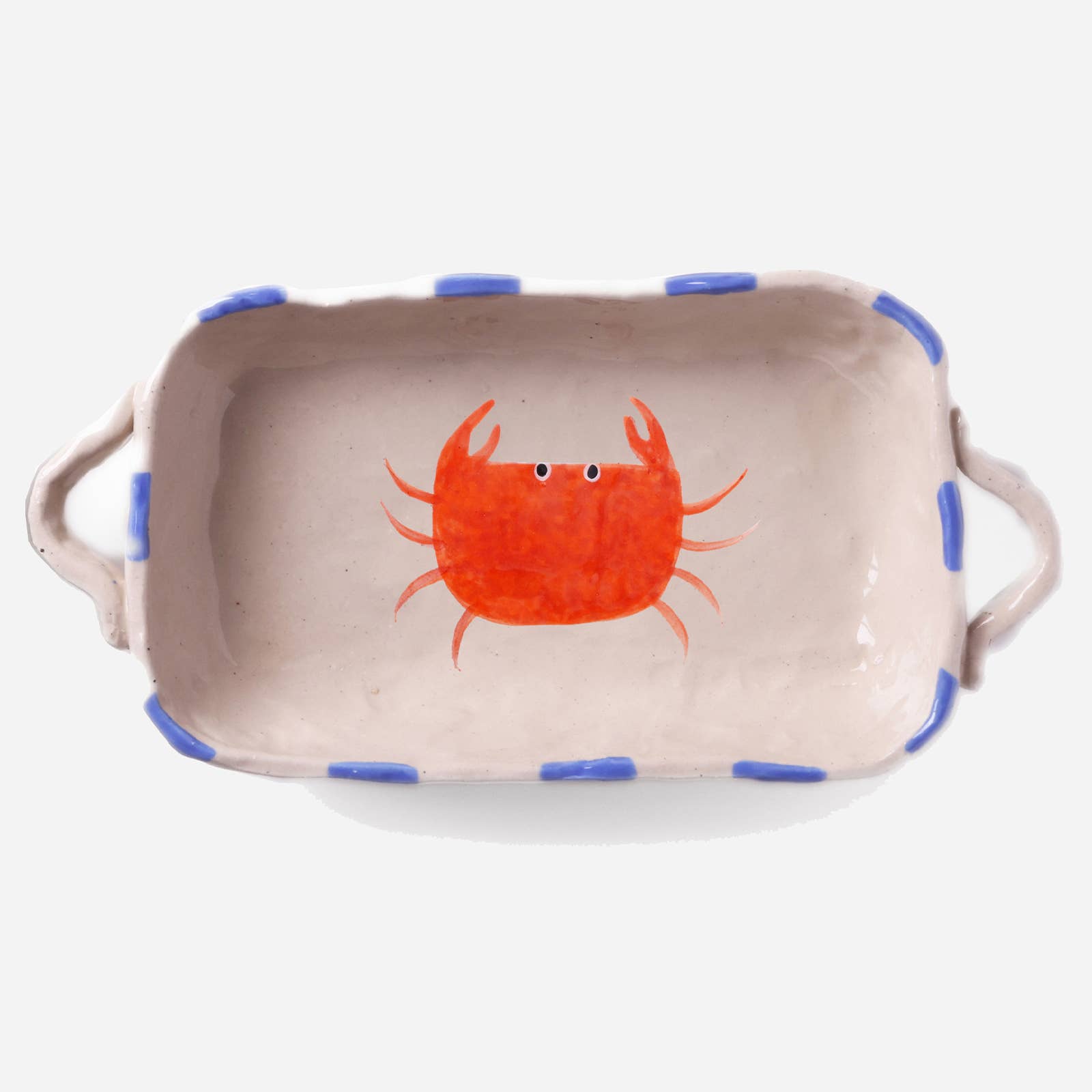 Rectangular ceramic dish with a red crab design on a beige background