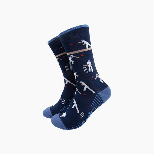 Navy blue socks with cricket-themed design on a white background