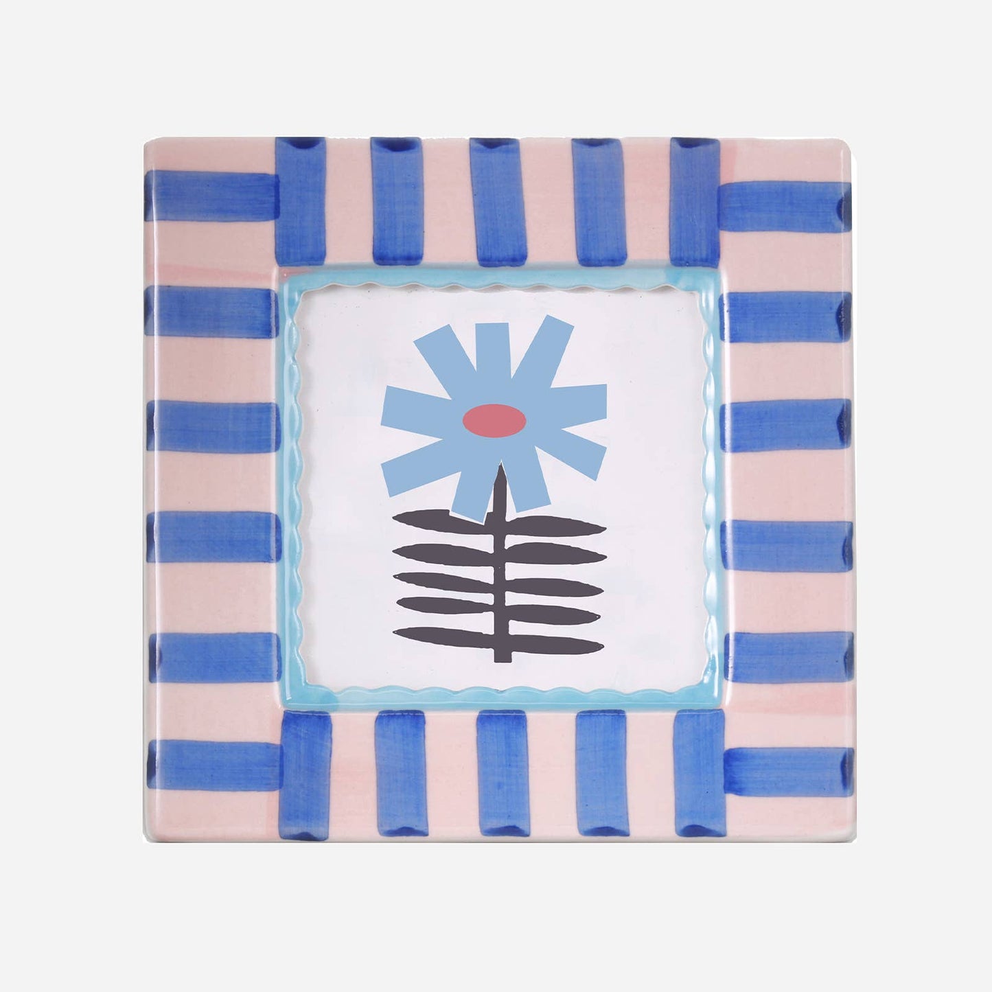 Decorative frame with pink and blue striped border featuring a central floral design.