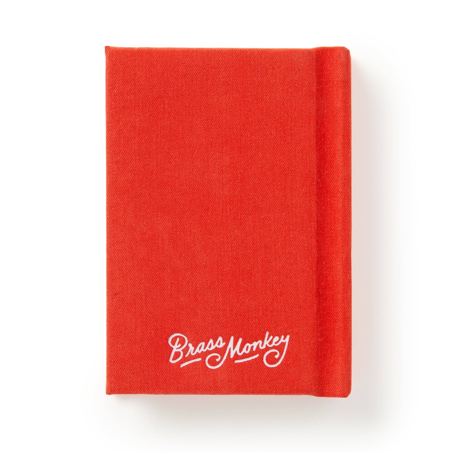 Red notebook with 'Brass Monkey' logo on a white background
