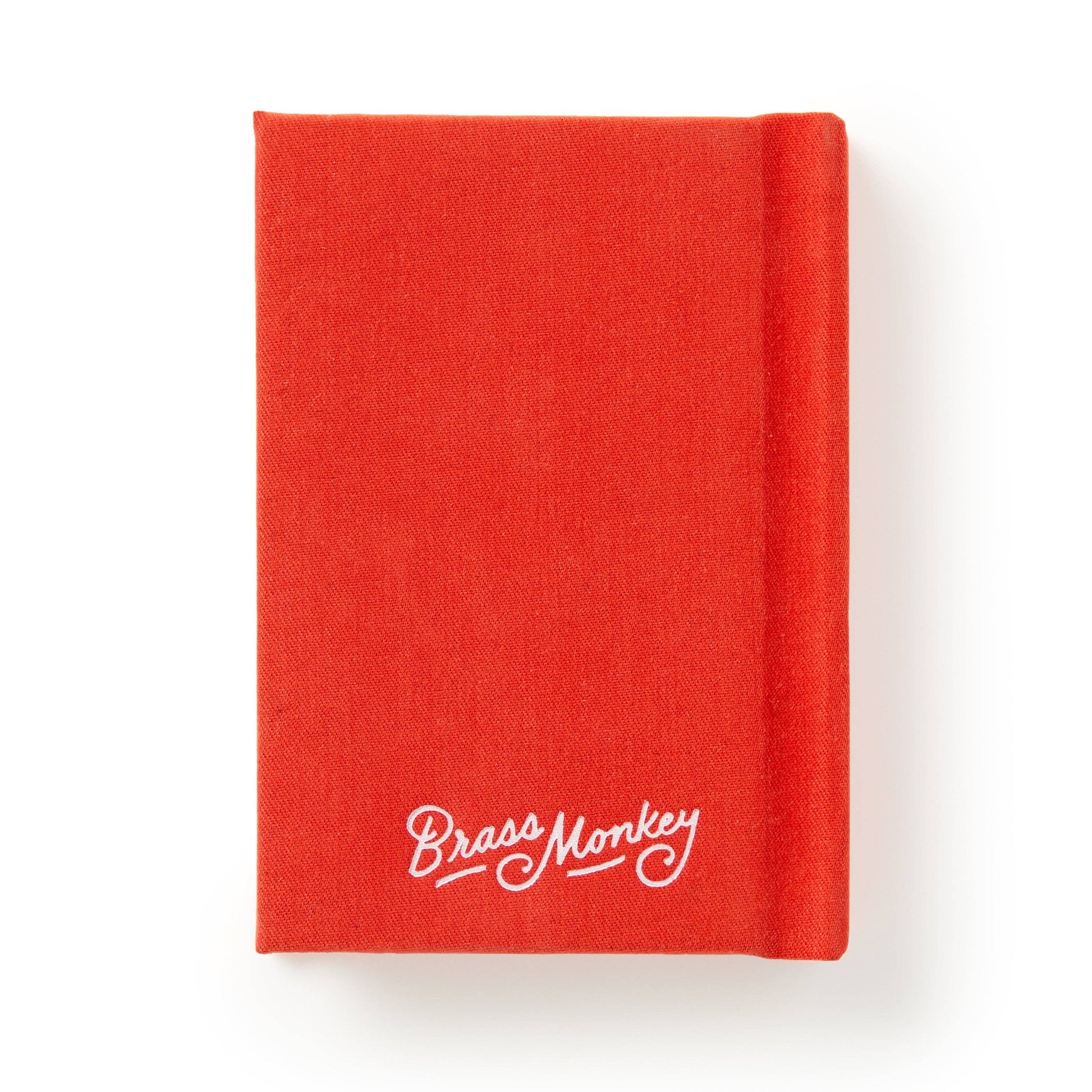 Red notebook with 'Brass Monkey' logo on a white background