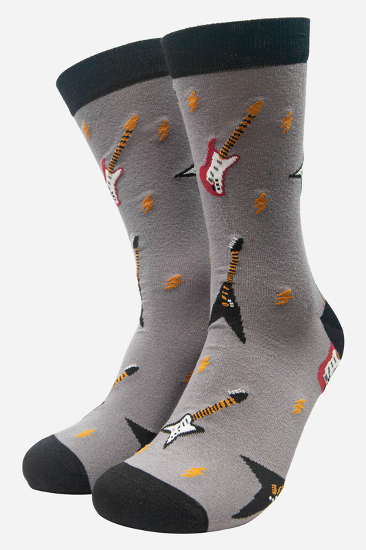 Gray socks with guitar designs on a white background