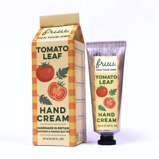 Hand cream packaging with tomato leaf design on a white background