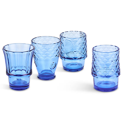 Set of five blue glass tumblers with textured design on a white background