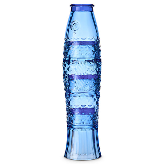 Blue glass vase with textured design on a white background