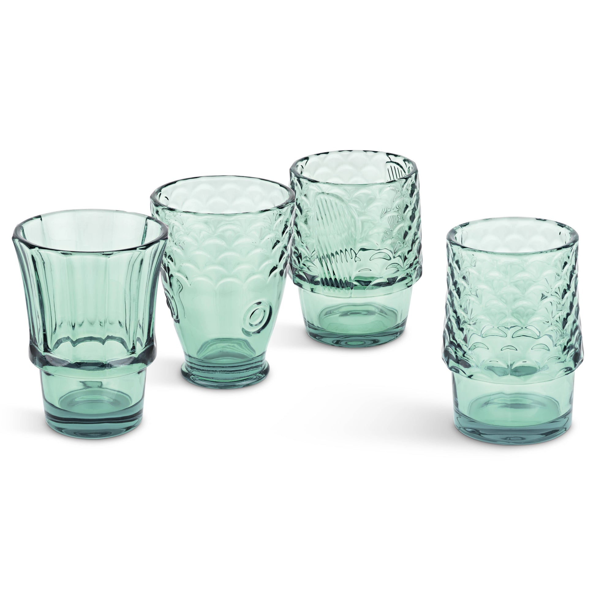 Set of five green glass tumblers with textured design on a white background