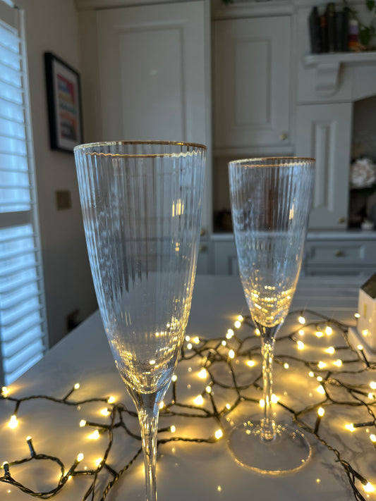 Gold rim ribbed flute glass