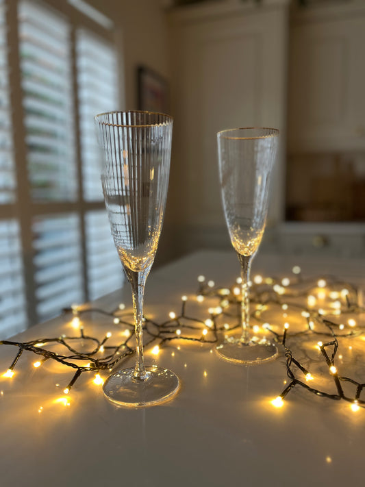 Gold rim ribbed flute glass