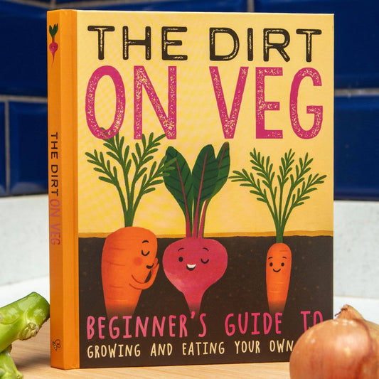 Book titled 'The Dirt on Veg' with illustrations of vegetables on a yellow background.