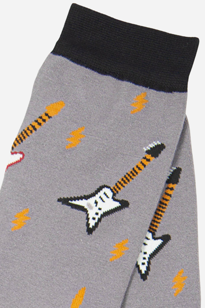 Gray sock with black guitar design on a light gray background