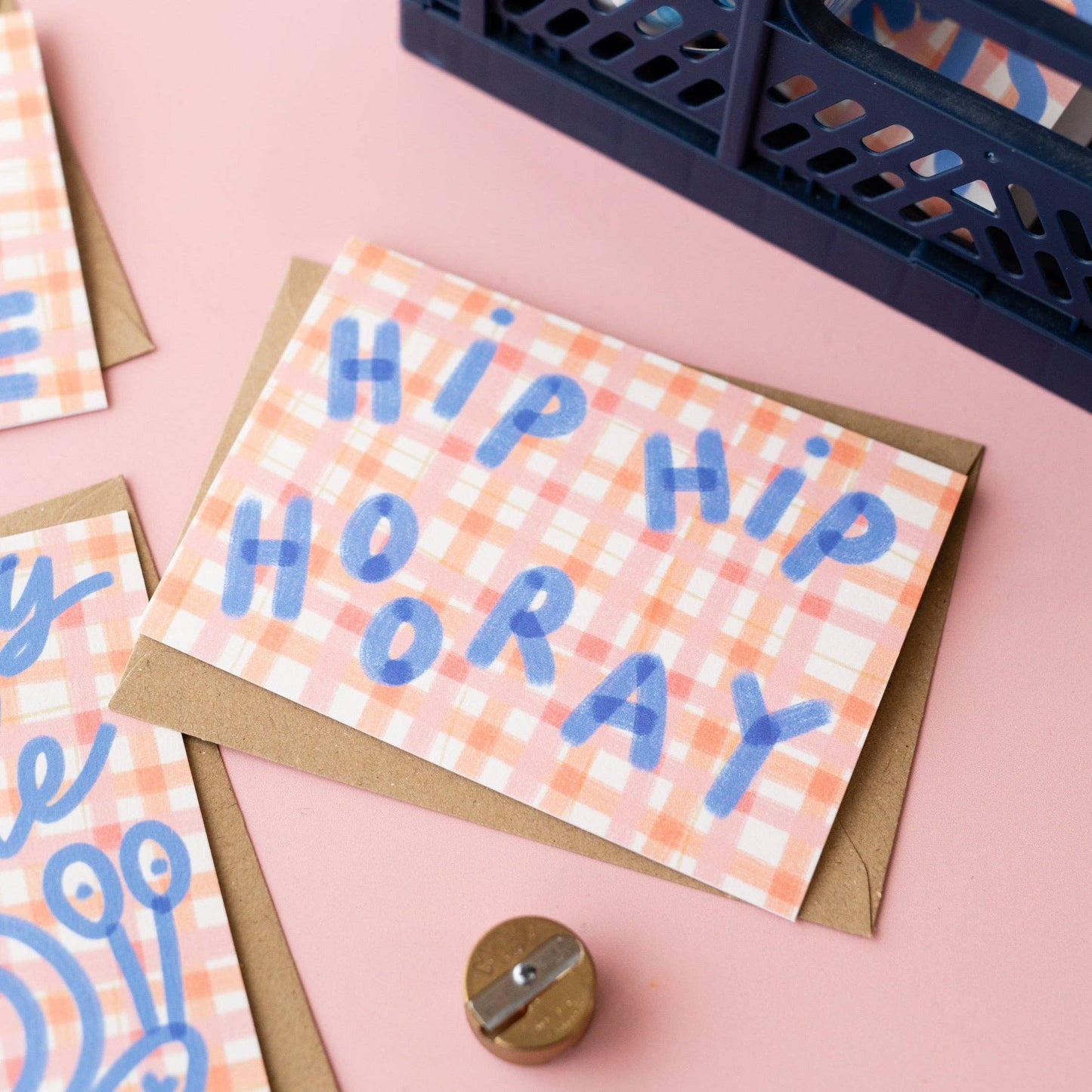 Greeting card with 'Hip Hip Ho RAY' text on a pink background