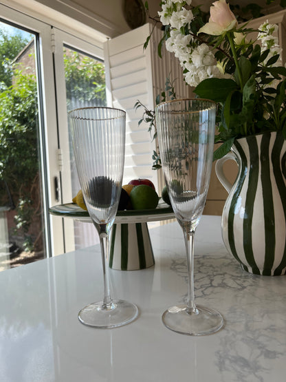 Gold rim ribbed flute glass