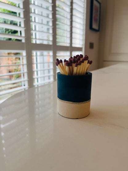 Two tone match pot with striker