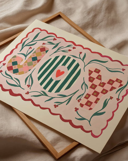 Decorative JOY christmas print with heart and checkered design on a beige fabric background