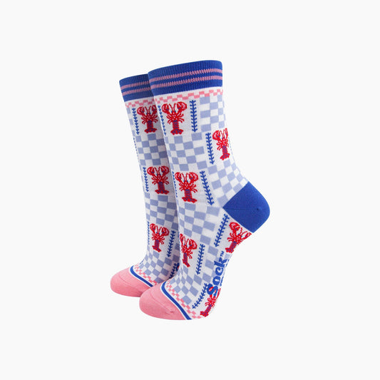 Pair of socks with lobster design on a checkered background