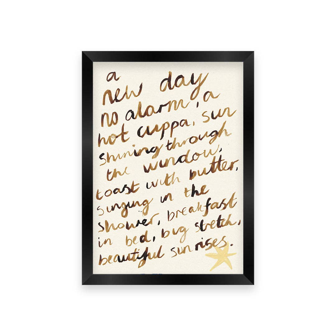 Framed print with handwritten text and a star on a white background