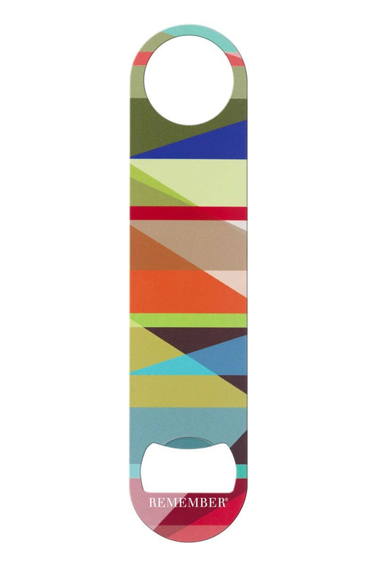 Colorful geometric patterned bottle opener with 'REMEMBER' branding on a white background