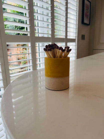 Two tone match pot with striker