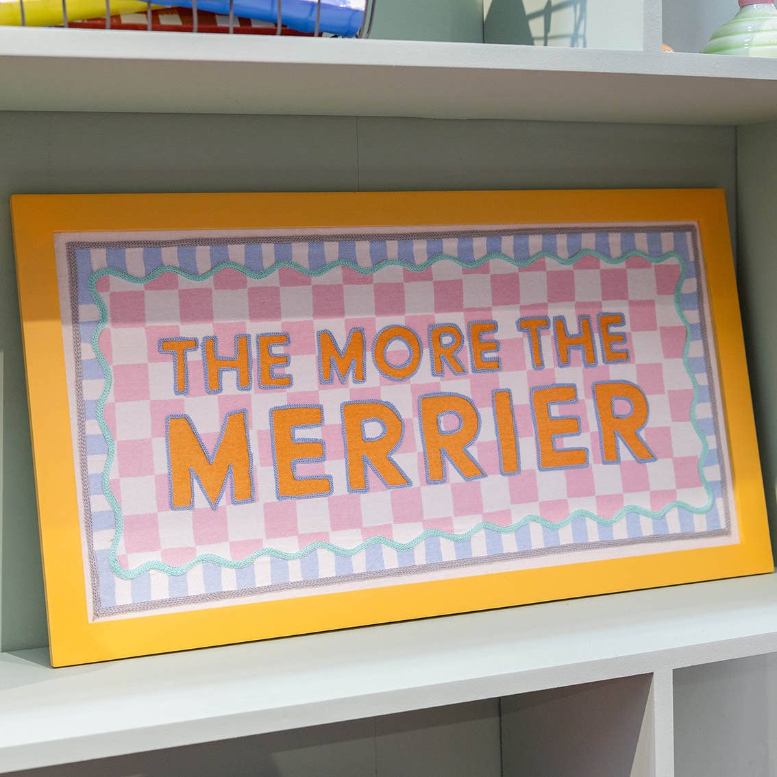 The More the Merrier Framed Fabric Print | Textile wallhanging