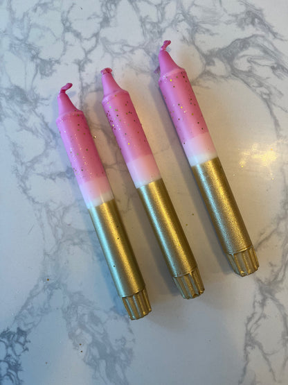 Pink and gold dipped glitter candles