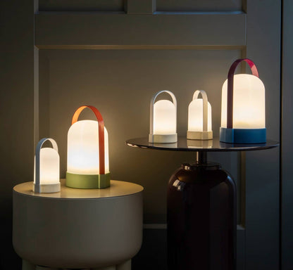 Colorful table lamps on a dark background