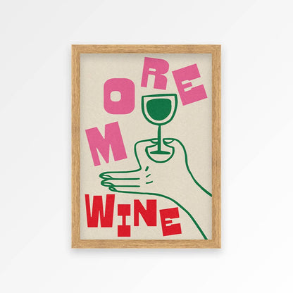 Framed artwork with a hand holding a wine glass and text 'MORE WINE' on a white background