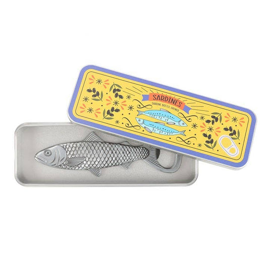 Metallic fish-shaped container with a colorful lid featuring floral designs and text.